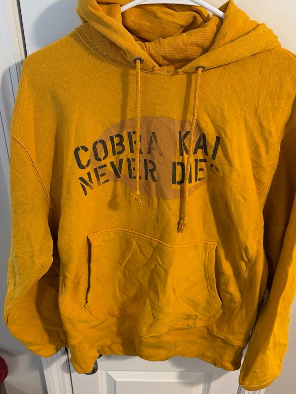 Champion Yellow 'Cobra Kai Never Dies' Pullover Hoodie